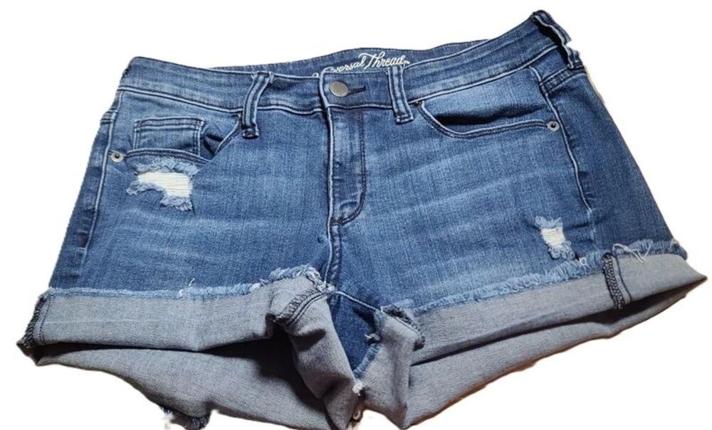 Universal Thread size 6 Women's distressed mid rise midi raw hem denim shorts